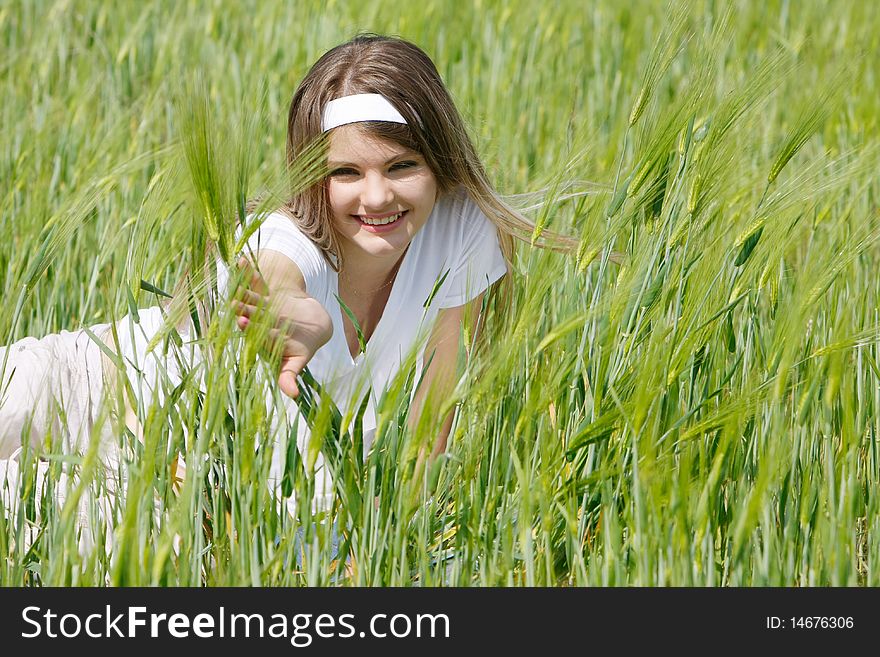 Young girl in green grass