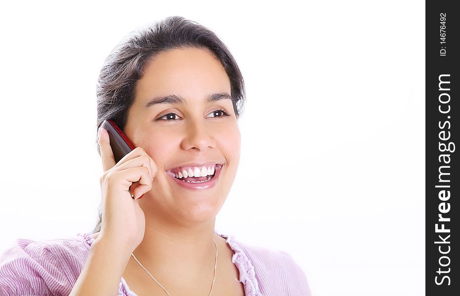 Young woman talking on cell phone. White background. Young woman talking on cell phone. White background