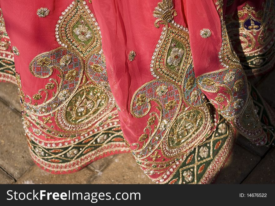 Closeup shot of an indian woman's dress. texture and details. Closeup shot of an indian woman's dress. texture and details