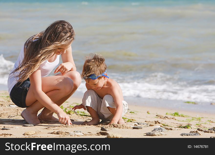 Mother And Son On Beach