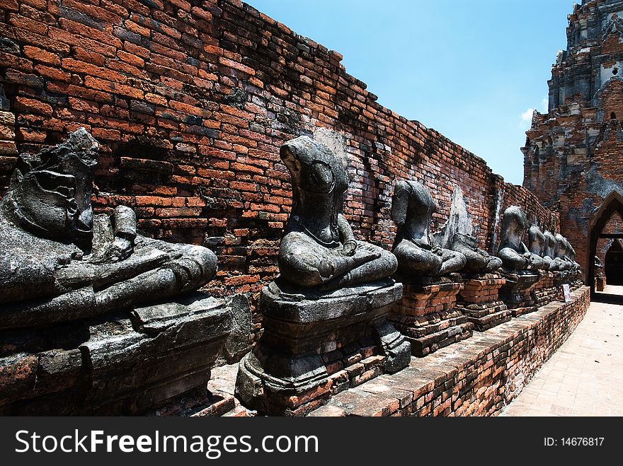 The old ruin image of buddha at Chai Watthanaram Temple,Ayutthaya,Thailand. The old ruin image of buddha at Chai Watthanaram Temple,Ayutthaya,Thailand