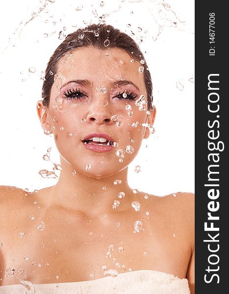 Beautiful woman with wet face from water splashing. Beautiful woman with wet face from water splashing