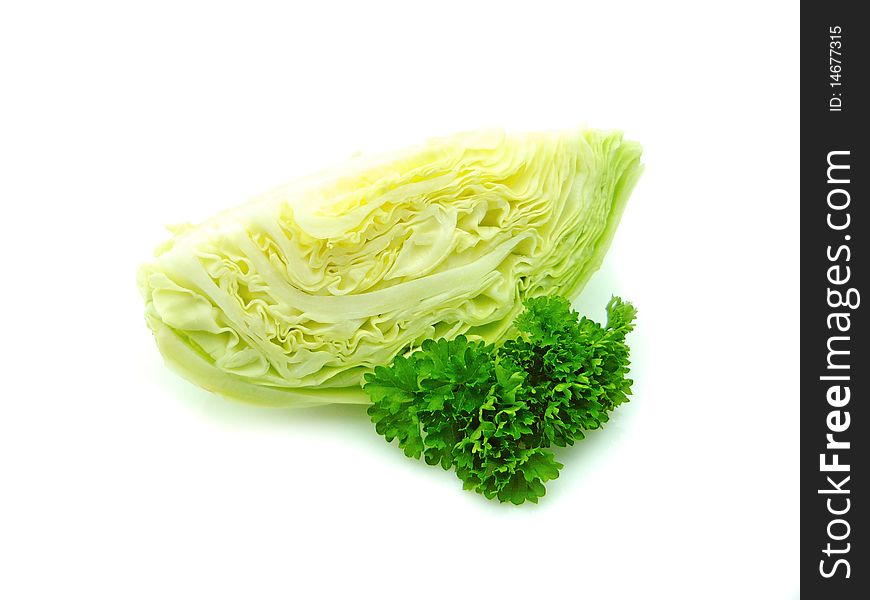 Young cabbage and juicy parsley on white background. Young cabbage and juicy parsley on white background