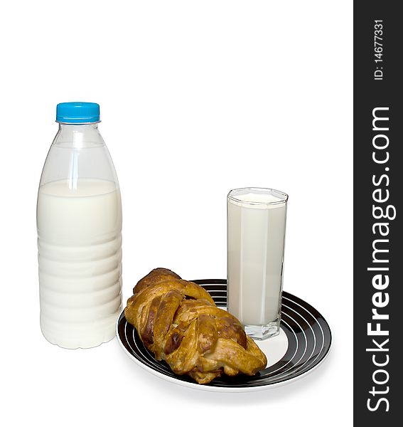 Milk with a roll is on the white background