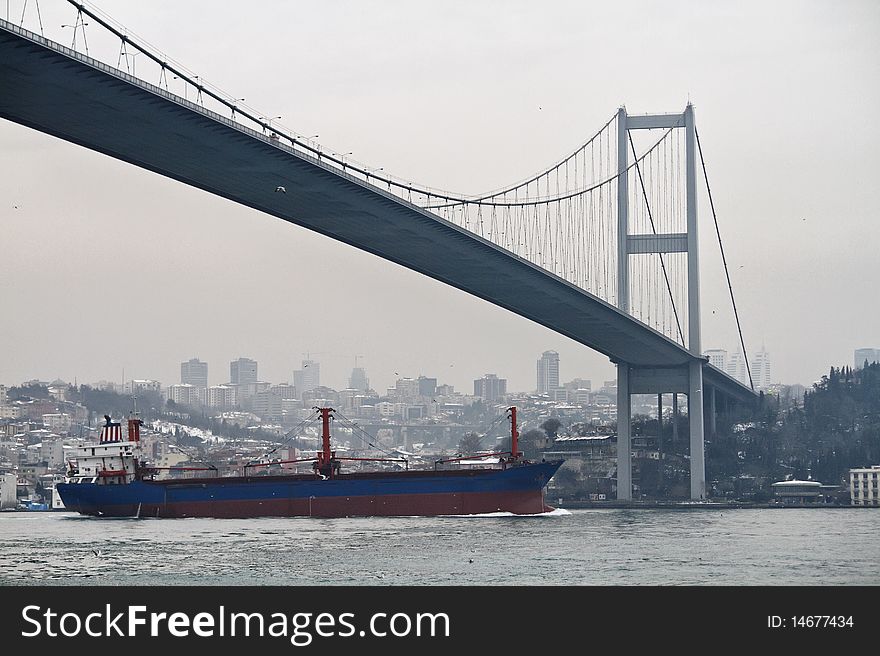 Turkey, Istanbul, Bosphorus Channel, Bosphorus Bridge, a cargo ship in the Channel