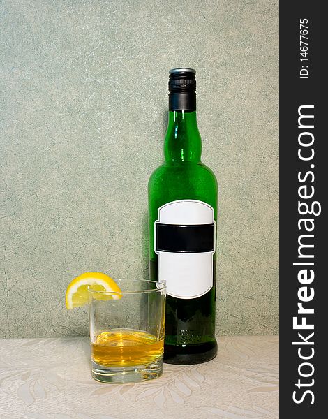 Bottle with whisky isolated on white background