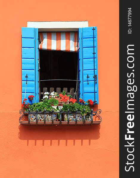 A colourful window in Venice. A colourful window in Venice