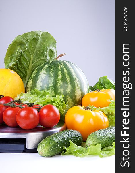 Fresh vegetables on gray background