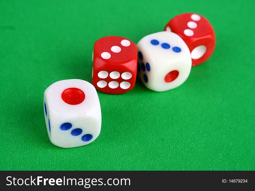 Macro of mahjong dices over pink background