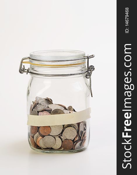 Time for saving, jar of US coins