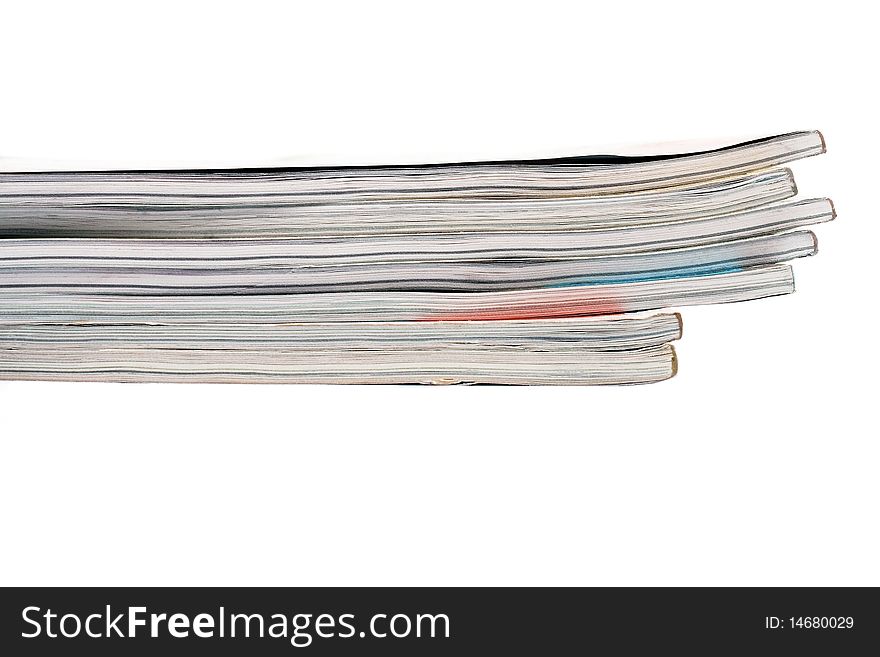 Stack of magazines isolated on a white