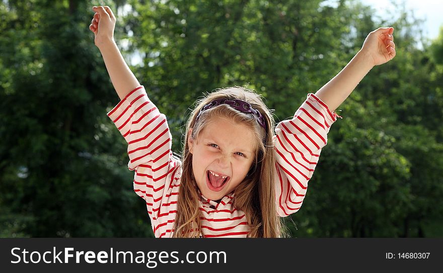 An image of a nice joyful girl outdoors