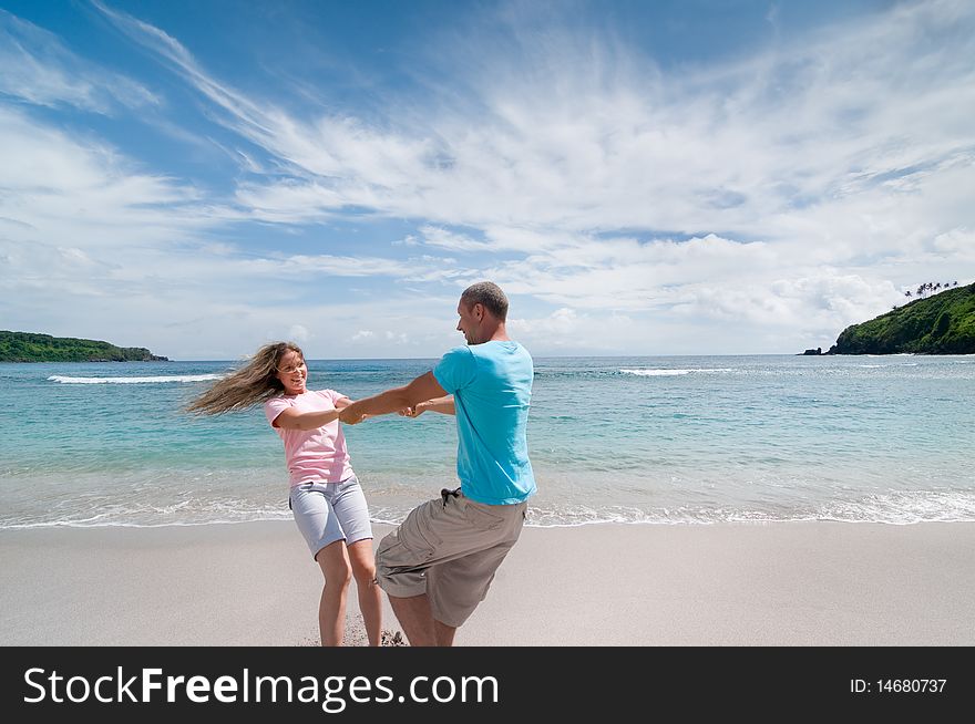 Couple having fun at seaside. Couple having fun at seaside