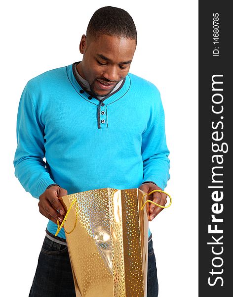 This is an image of a man holding a shopping bag. This is an image of a man holding a shopping bag.