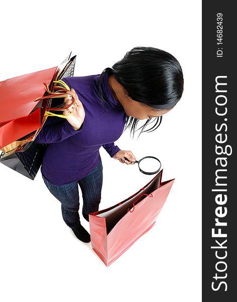 This is an image of a woman holding a shopping bag. This is an image of a woman holding a shopping bag.