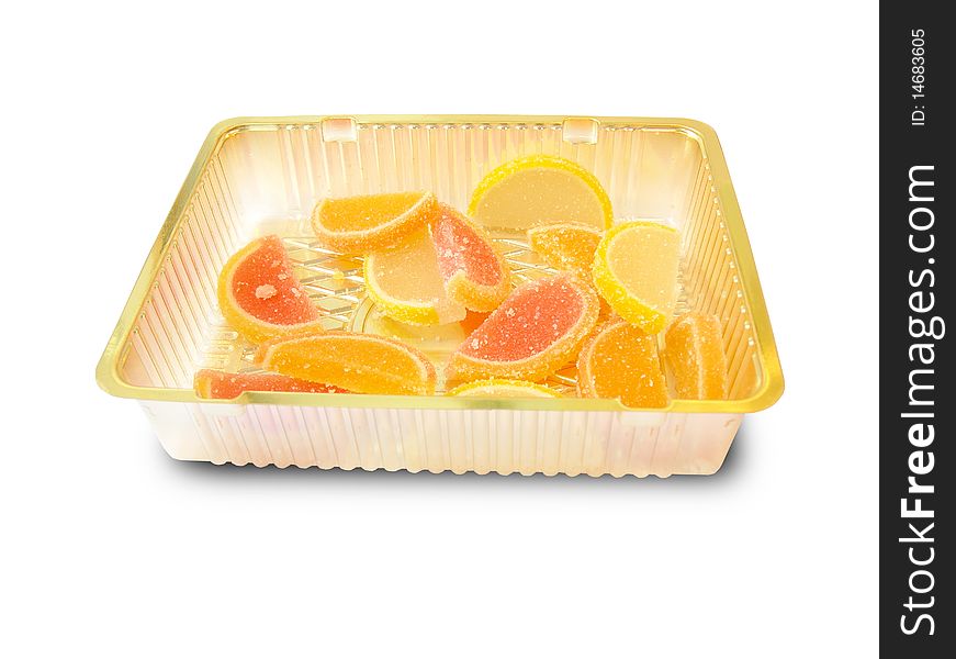 Multi-colored marmelade in a plastic tray shown in the picture. Multi-colored marmelade in a plastic tray shown in the picture.