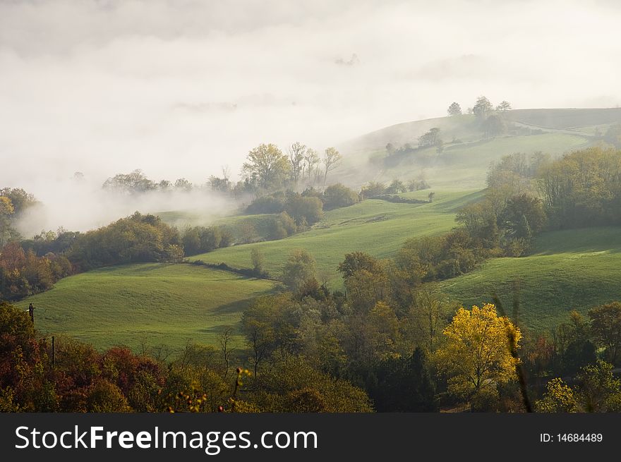 The tops of hills in the clouds