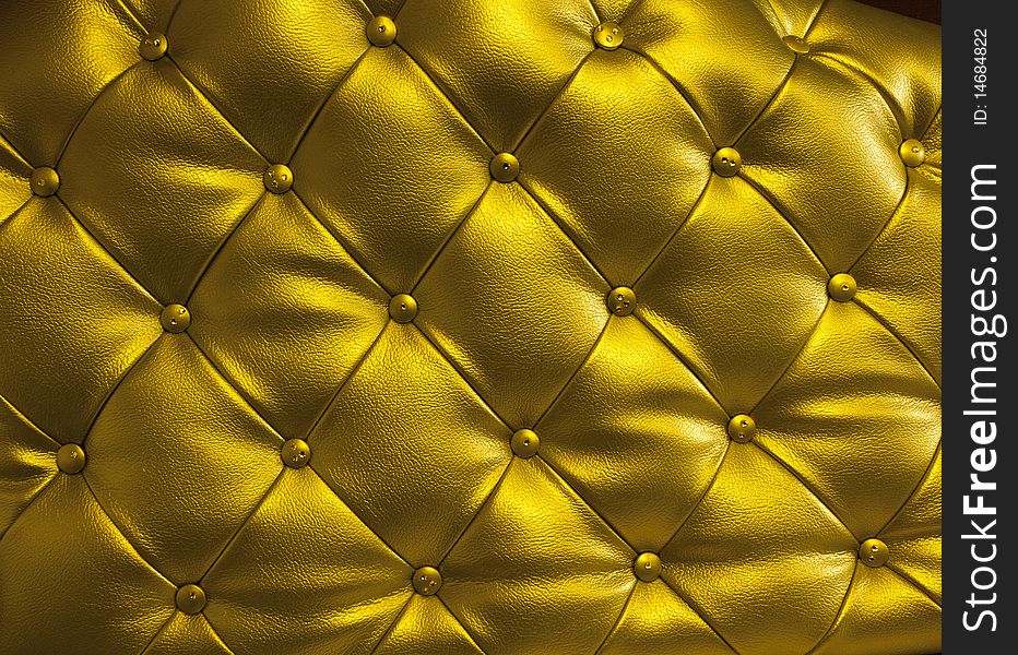 Golden couch with cristal buttons. Golden couch with cristal buttons