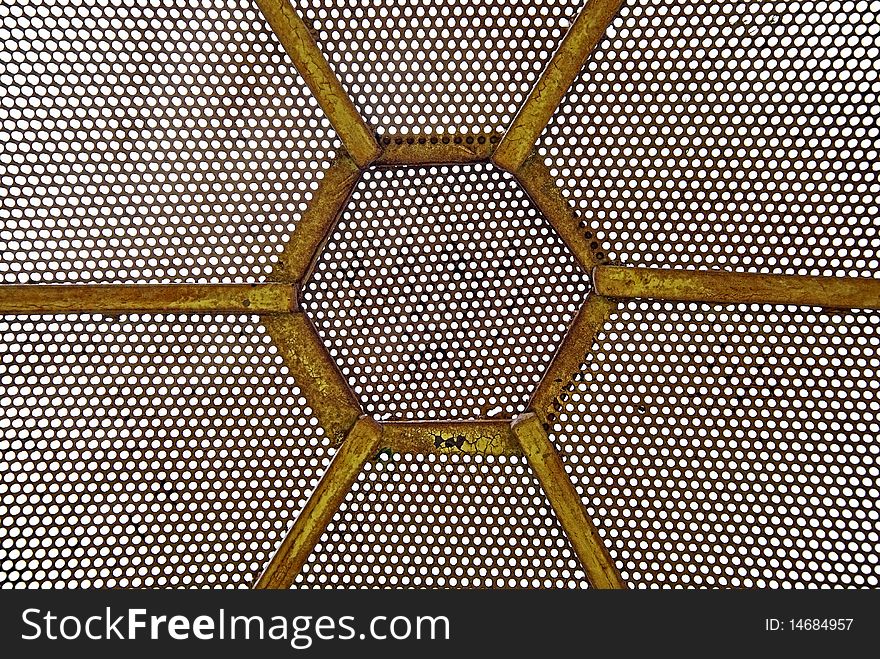 Yellow grunge and abstract iron pattern with holes. Yellow grunge and abstract iron pattern with holes