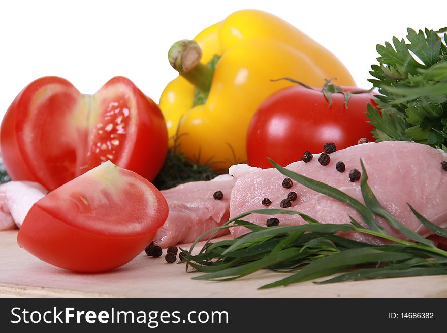 Fresh vegetables and pork isolated on a white background. Fresh vegetables and pork isolated on a white background