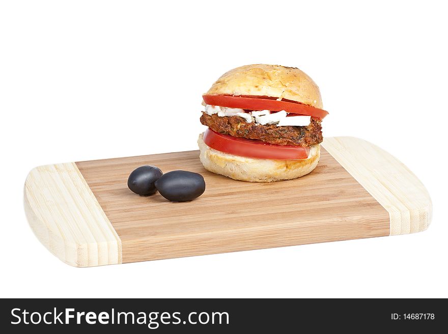 Vegetarian sandwich on a wooden plate. Vegetarian sandwich on a wooden plate