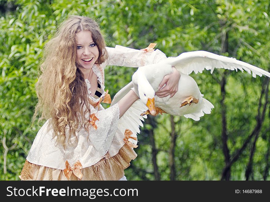 Girl has caught a goose