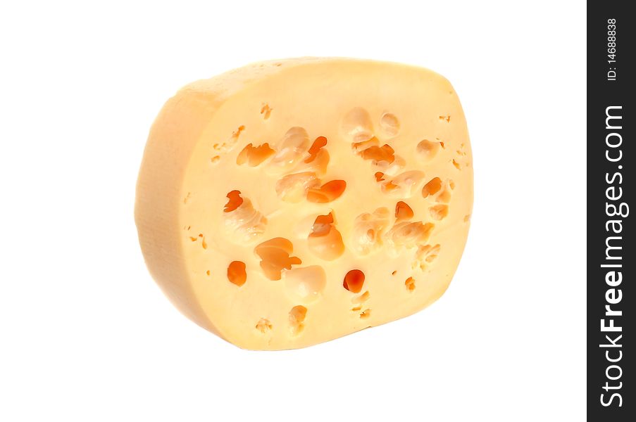 The yellow cheese with holes on the white background