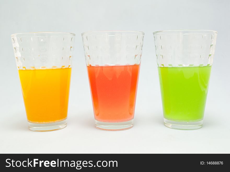 Glasses of orange juice, kiwi and strawberry. Glasses of orange juice, kiwi and strawberry