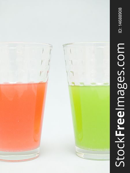 Glasses with kiwi and strawberry juices. Glasses with kiwi and strawberry juices