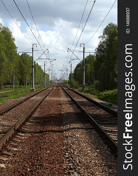 Railwayroad in the forest in summer