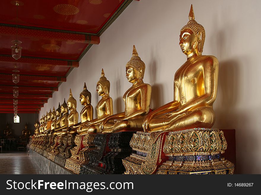 Golden Buddha statues in the temple, Bangkok, Thai. Golden Buddha statues in the temple, Bangkok, Thai