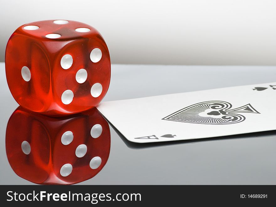 Red dice with reflection and playing card. Red dice with reflection and playing card