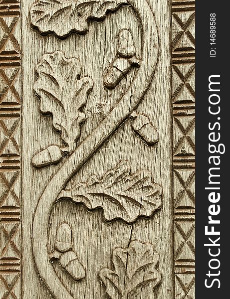 Detail of wood carving on a transylvanian gate.