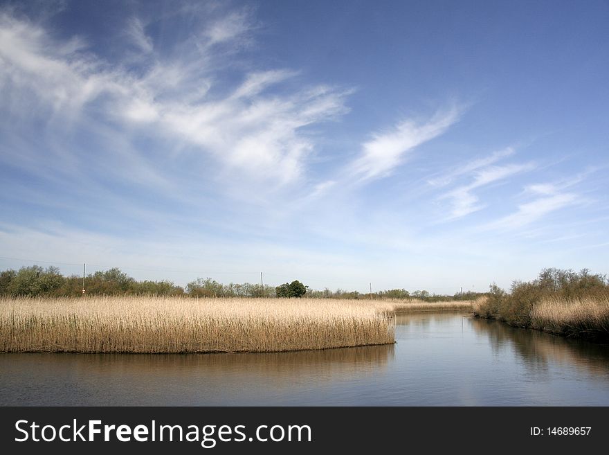 Landscape with a lake and blue sky