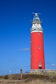 Lighthouse In The Dunes At The Beach Stock Photo Lighthouse In The Dunes At The Beach Stock Photo