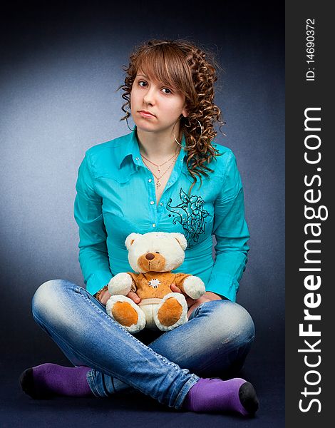 Young teen with teddy