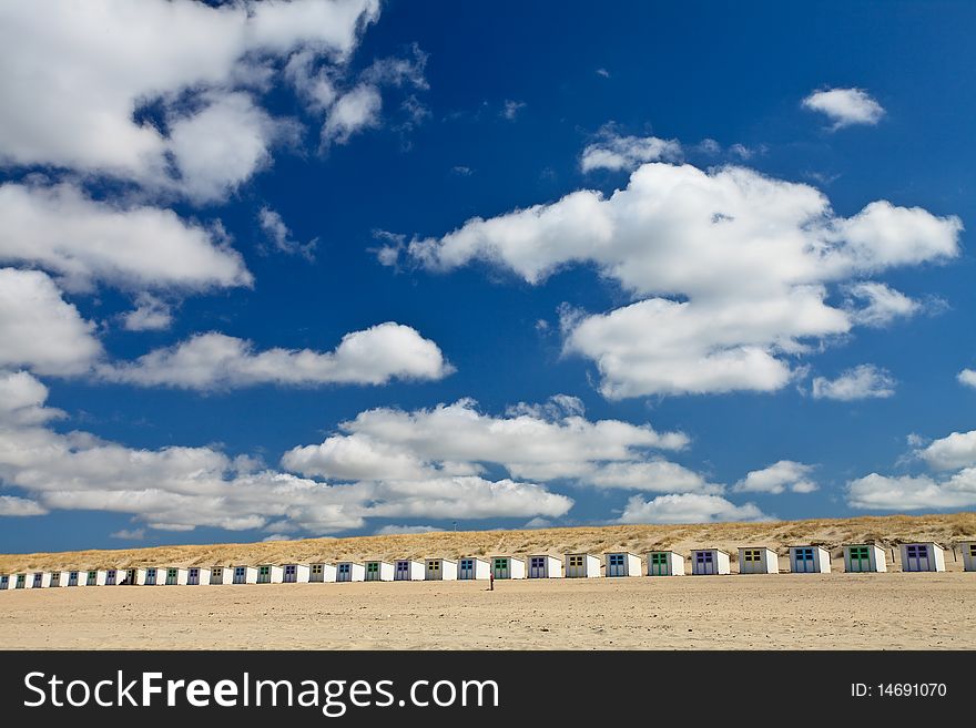 Small rental cabin on the beach with clouds in the blue sky