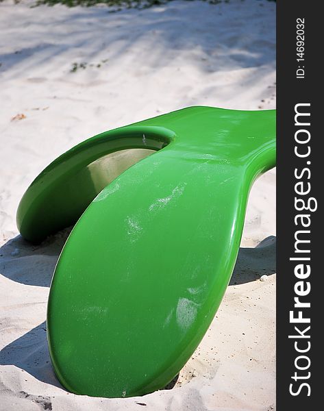 Green chair style on beach