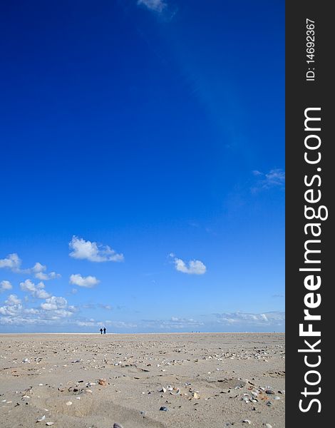 A Blue Clear Sky With Beach And Ocean