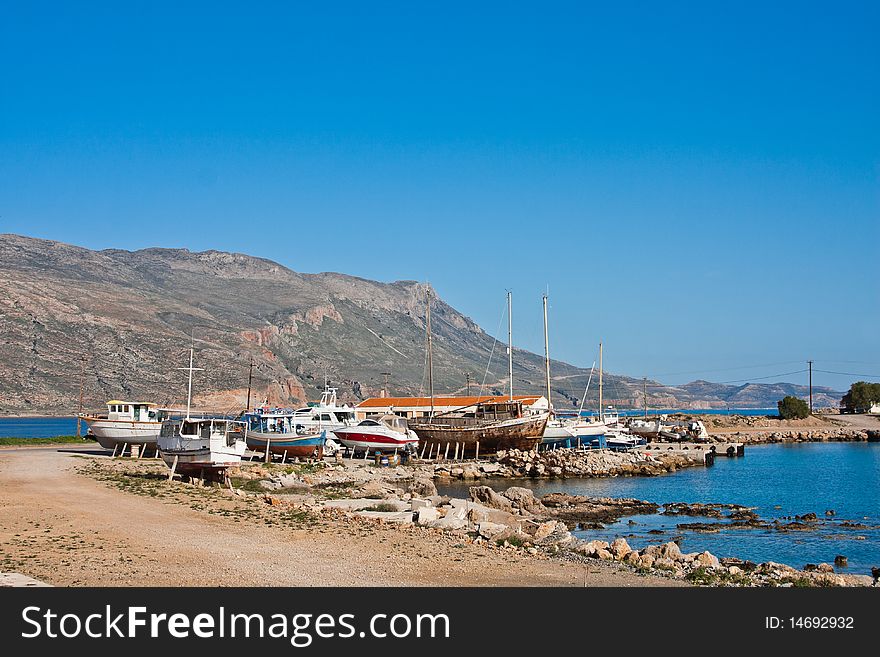 Boats in Kavonisi Harbour in Crete, Greece