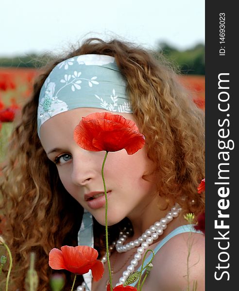 Girl with a poppy near Dnepropetrovsk 2010
