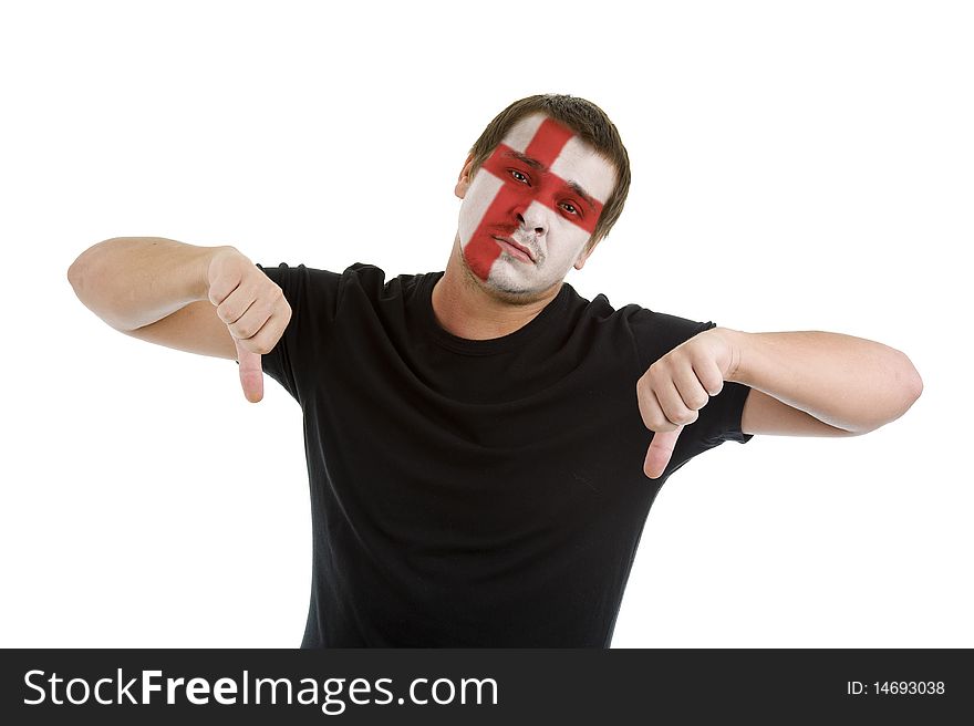 Man with english flag painted on his face showing two thumbs down, isolated on white background. Man with english flag painted on his face showing two thumbs down, isolated on white background
