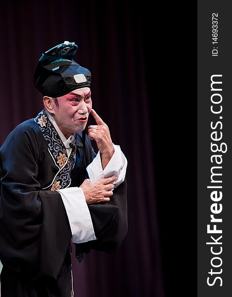 China Opera Scholar Pointing To His Nose