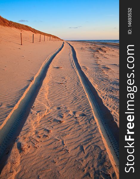 Beautiful Sunset At The Beach With Sand Dunes