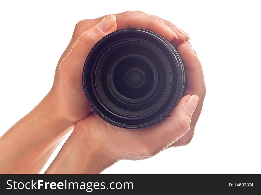 Photo lens in woman's hands. Isolated on white. Photo lens in woman's hands. Isolated on white