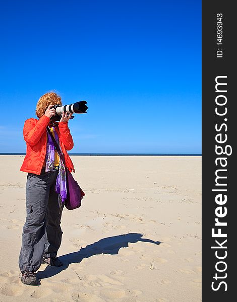 Women photographer on the beach