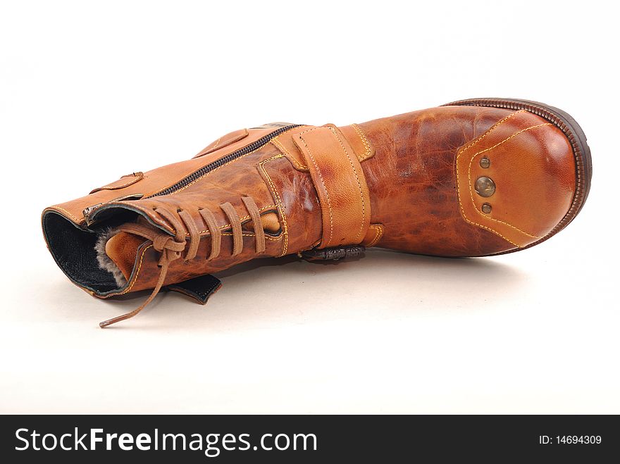 Women leather boots on a white background