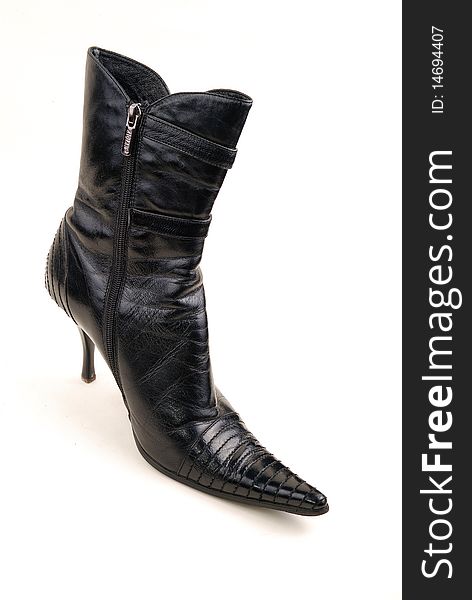 Black shine woman boot isolated over white