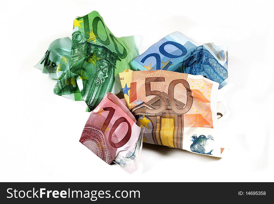 Wrinkled banknotes from 10 to 100 Euro on white background. Wrinkled banknotes from 10 to 100 Euro on white background