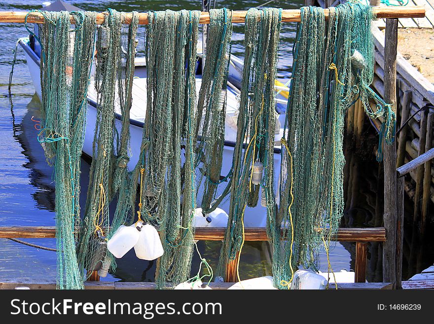 Fishing nets being put out to dry. Fishing nets being put out to dry